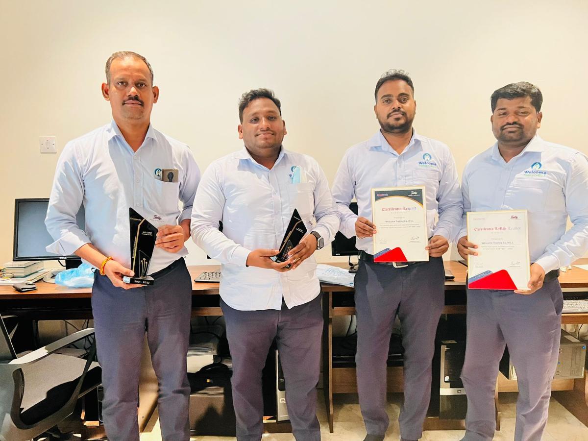 Excellentia Award with Staff